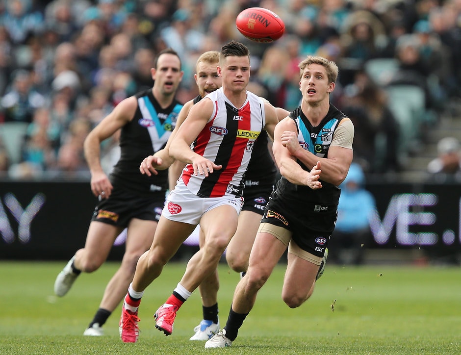 AFL 2015 Rd 18 - Port Adelaide v St Kilda ADELAIDE, AUSTRALIA - AUGUST 2: Jack Sinclair of the Saints chases Hamish Hartlett of the Power during the 2015 AFL round 18 match between Port Adelaide Power and the St Kilda Saints at Adelaide Oval, Adelaide, Australia on August 2, 2015. (Photo by James Elsby/AFL Media)